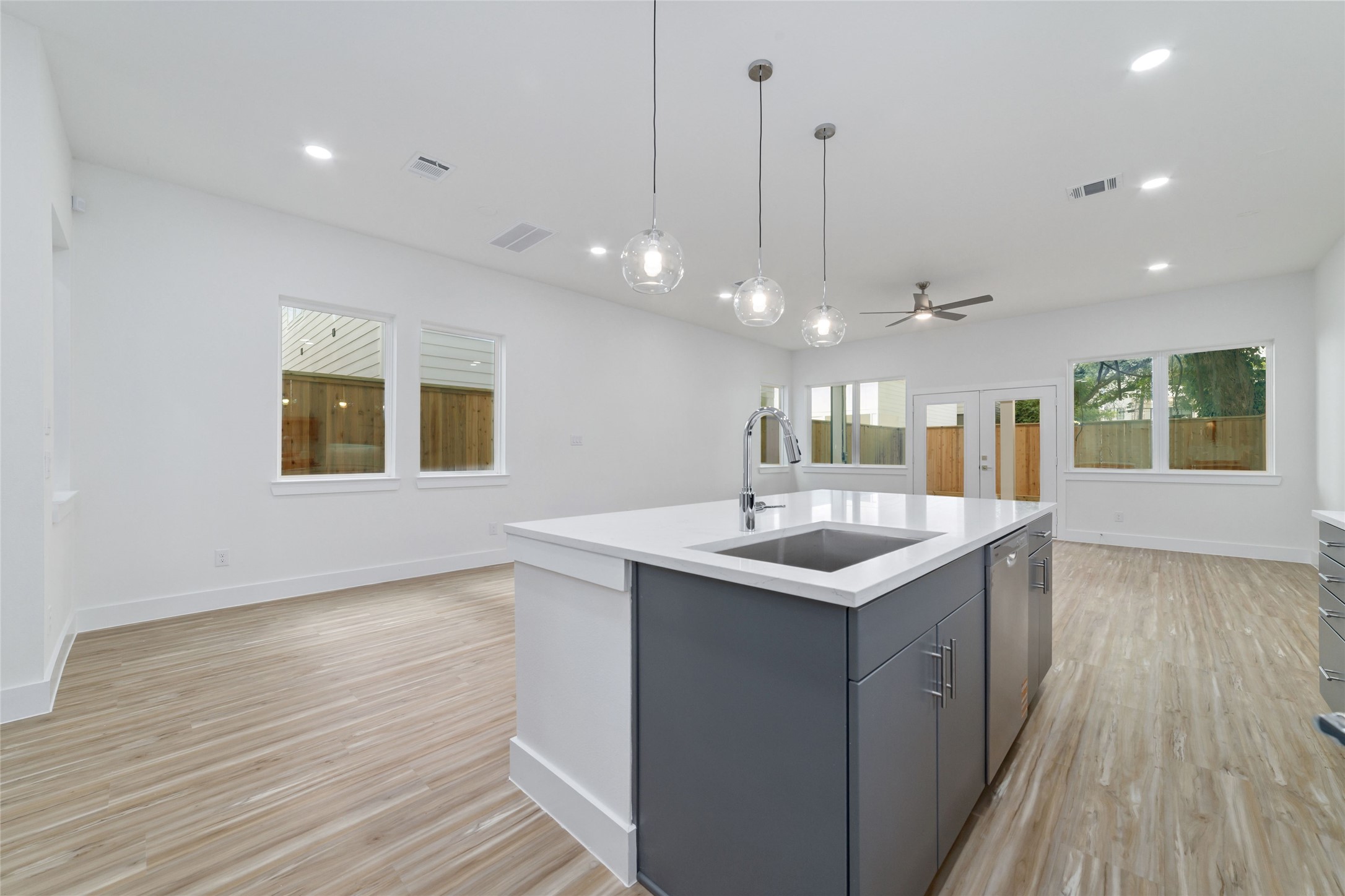 2109 Holman Street Houston, TX 77004 - Photo 10 of 30 Another View of The Stunning Island with Modern Lighting