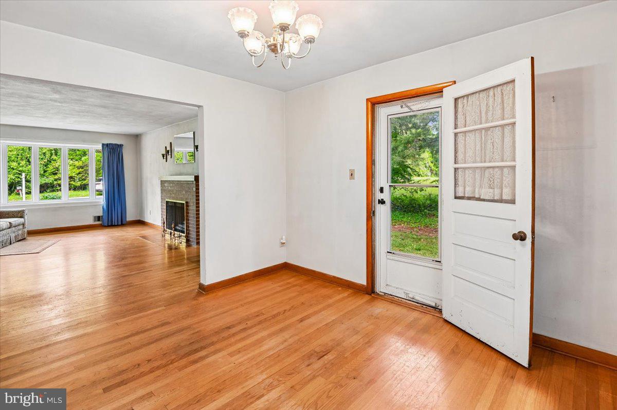 1509 Duvall Road Annapolis, MD 21409 - Photo 23 of 39 a view of empty room with wooden floor and fan