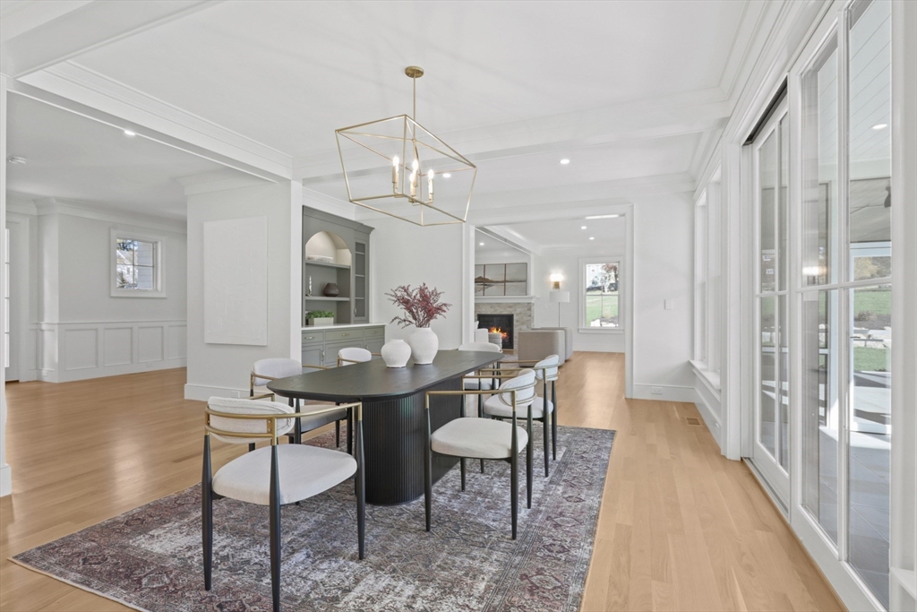 56 Sunset Rock Road Andover, MA 01810 - Photo 17 of 42 a view of a dining room with furniture