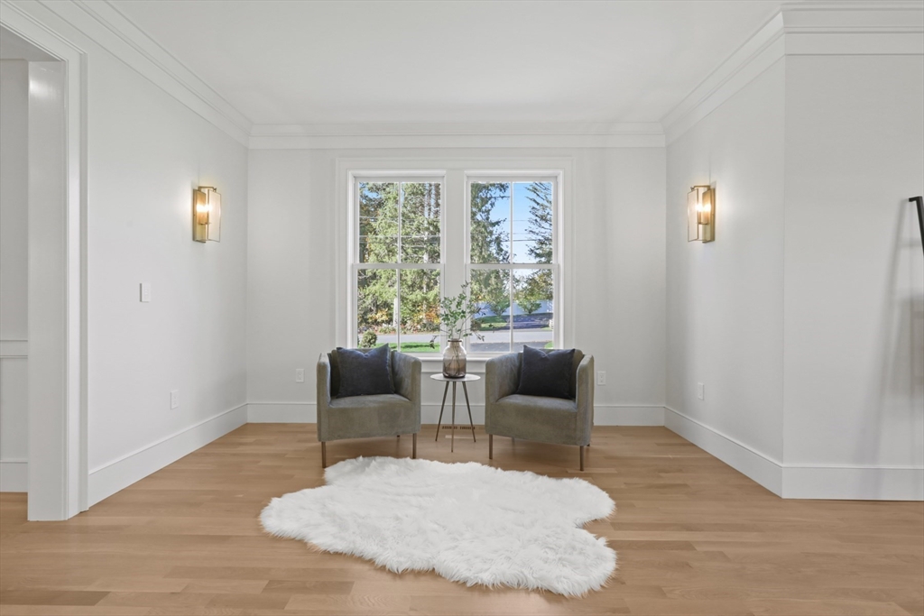 56 Sunset Rock Road Andover, MA 01810 - Photo 21 of 42 a living room with furniture and a window
