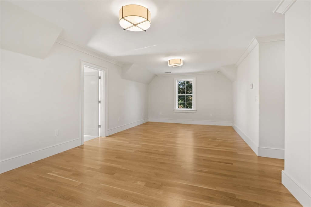 56 Sunset Rock Road Andover, MA 01810 - Photo 32 of 42 a view of empty room with wooden floor