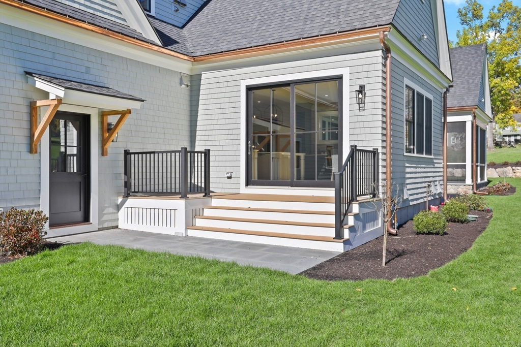 56 Sunset Rock Road Andover, MA 01810 - Photo 6 of 42 a view of a entrance door of the house