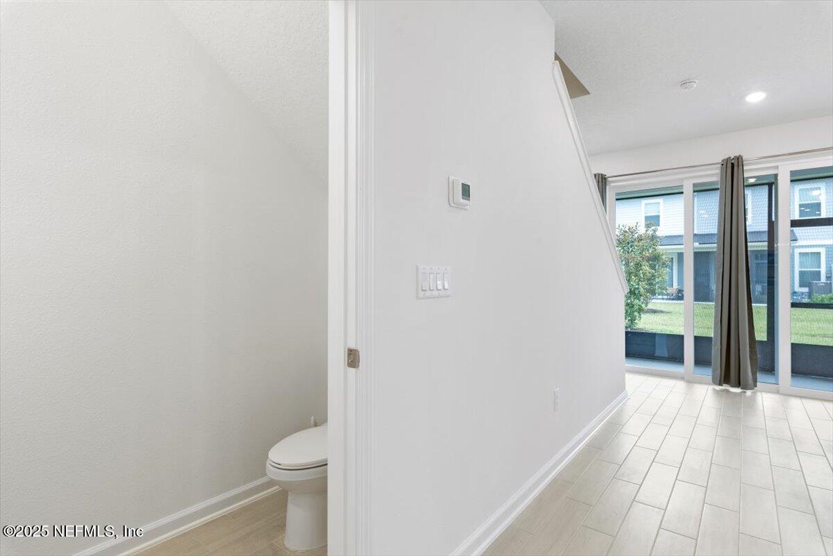 39 Thurnham Lane St. Augustine, FL 32092 - Photo 16 of 52 a bathroom with a toilet and a shower