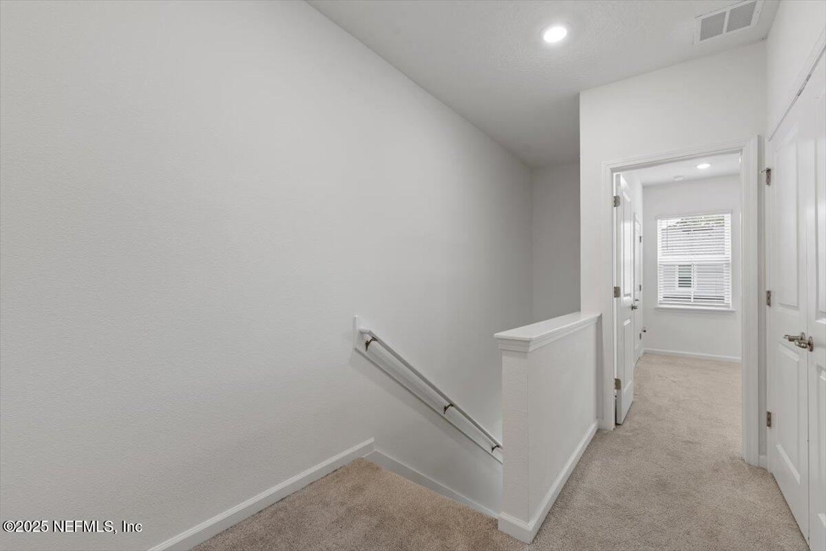 39 Thurnham Lane St. Augustine, FL 32092 - Photo 28 of 52 wooden floor in an empty room