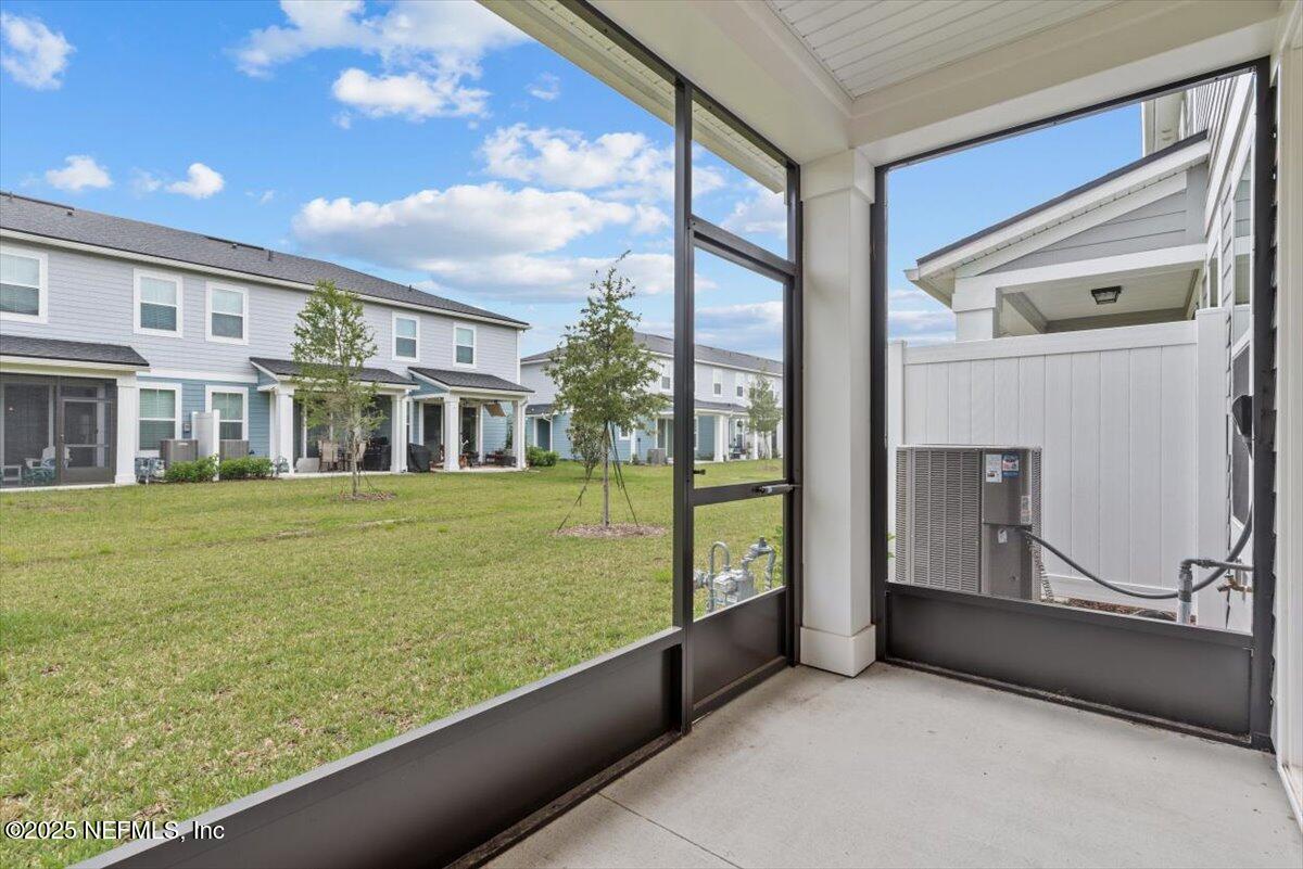 39 Thurnham Lane St. Augustine, FL 32092 - Photo 35 of 52 a view of an house with backyard porch and sitting area