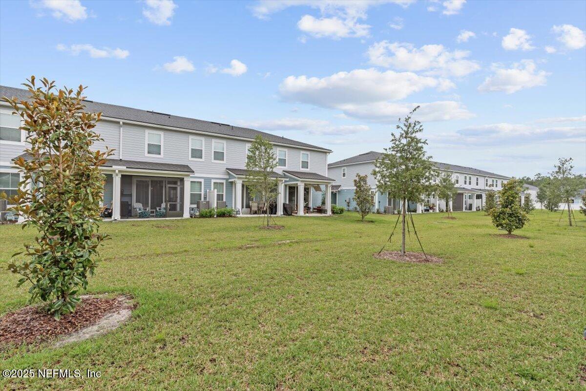 39 Thurnham Lane St. Augustine, FL 32092 - Photo 38 of 52 a house view with a garden space