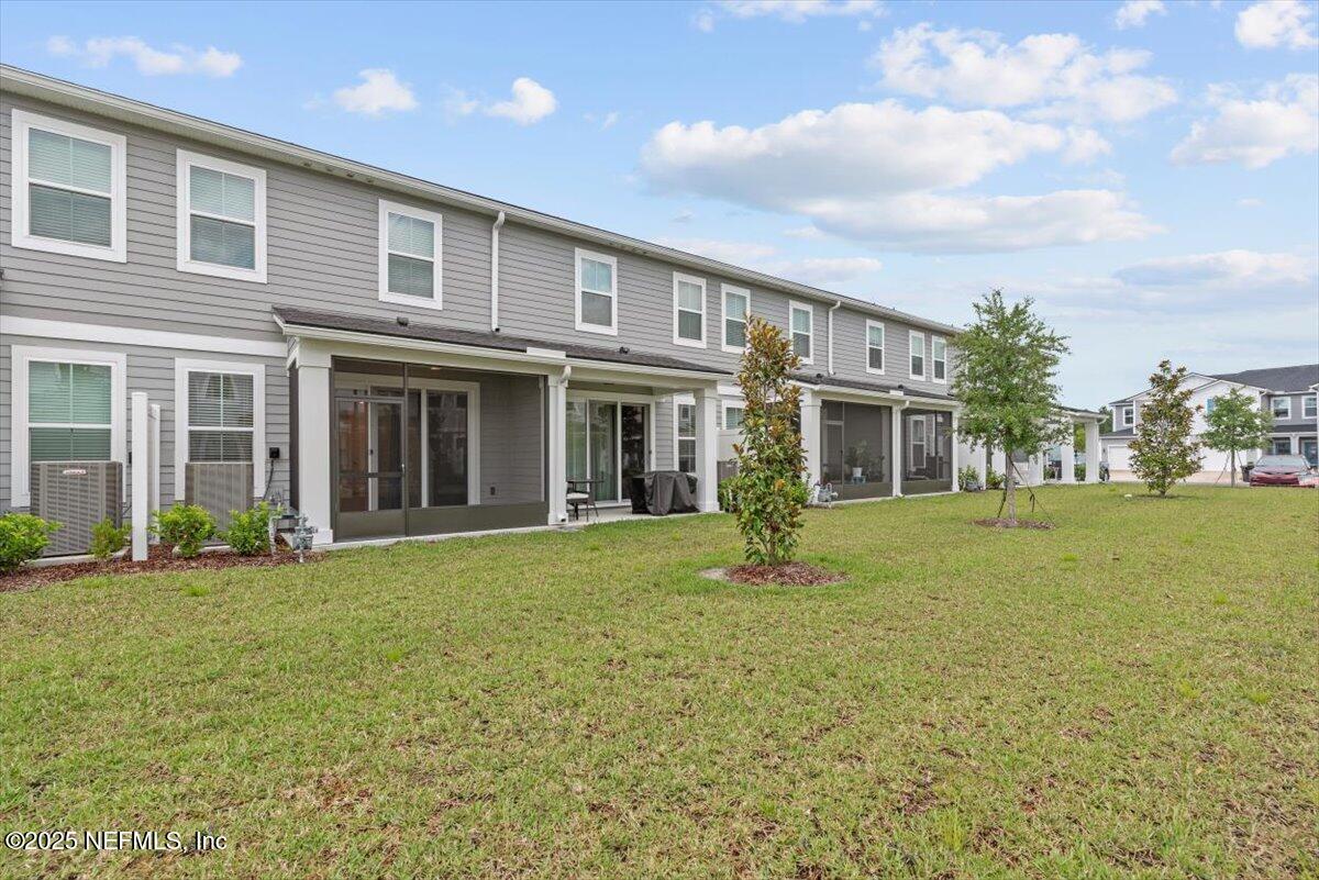 39 Thurnham Lane St. Augustine, FL 32092 - Photo 46 of 52 front view of a house with a yard