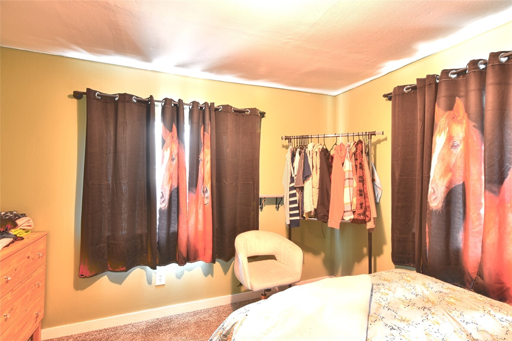 15421 Jim Creek Road Arlington, WA 98223 - Photo 16 of 27 a bedroom with a bed and a dresser