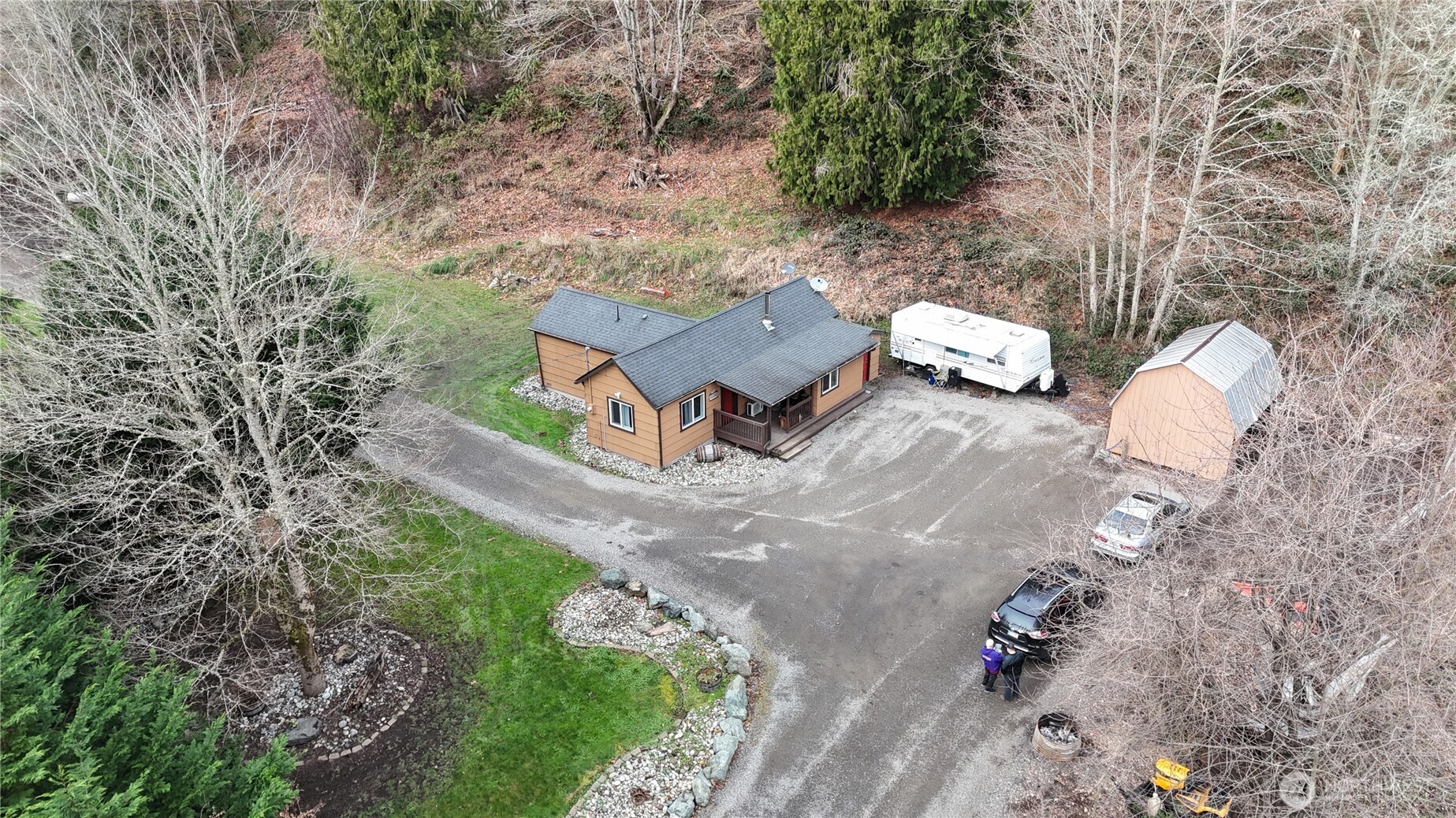 15421 Jim Creek Road Arlington, WA 98223 - Photo 25 of 27 a view of a house with a yard
