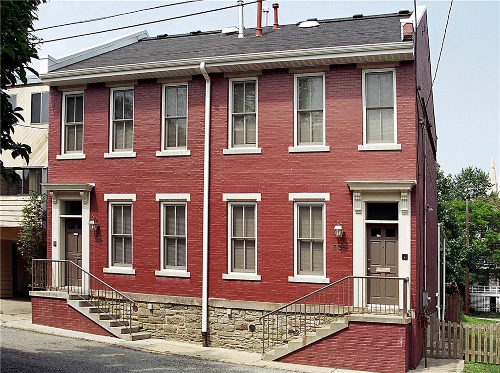 326 Hailman Street Pittsburgh, PA 15206 - Photo 22 of 22 a red brick building with glass windows