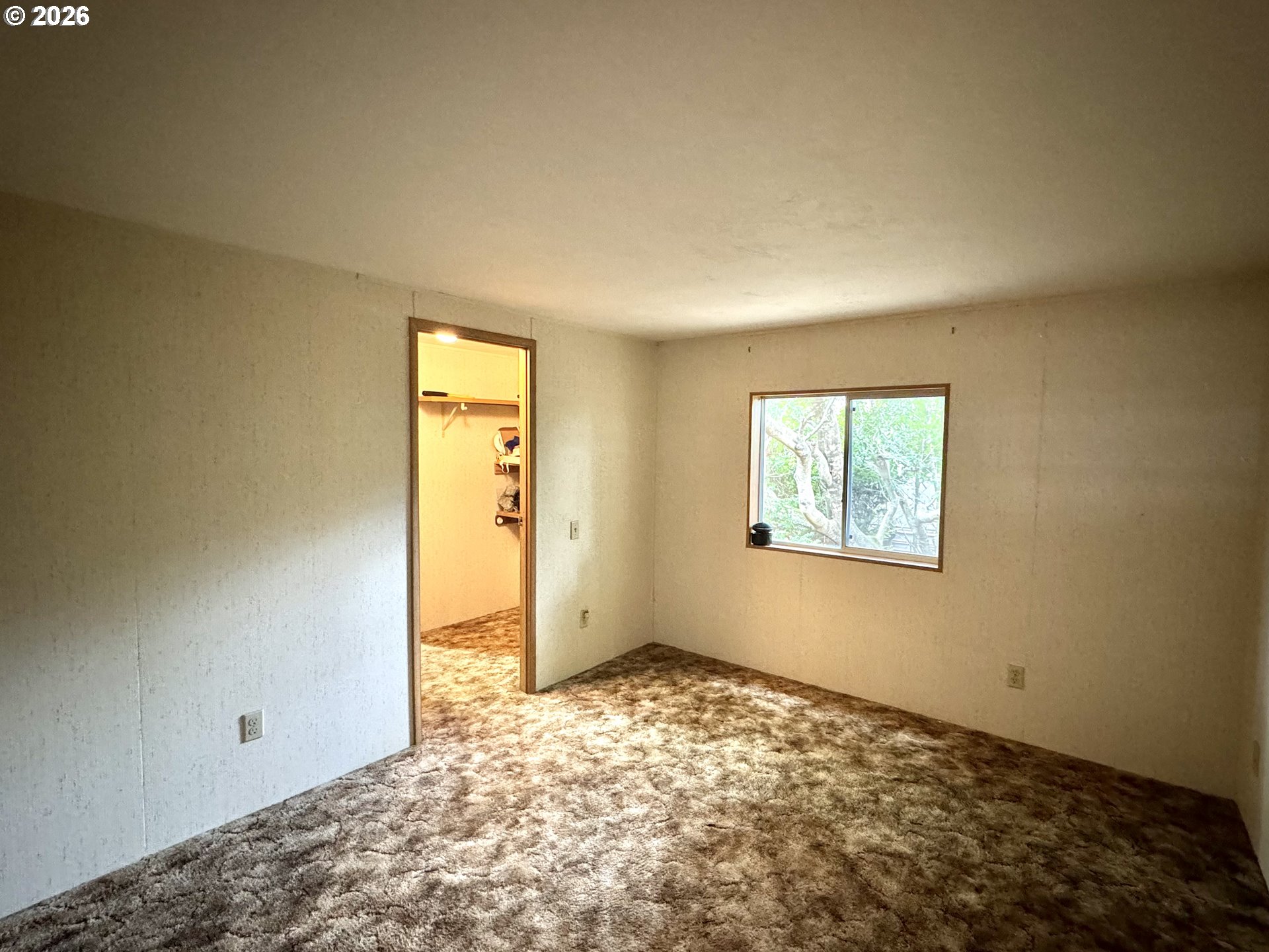 1600 Rhododendron Drive, Unit 245 Florence, OR 97439 - Photo 30 of 47 a view of an empty room and window