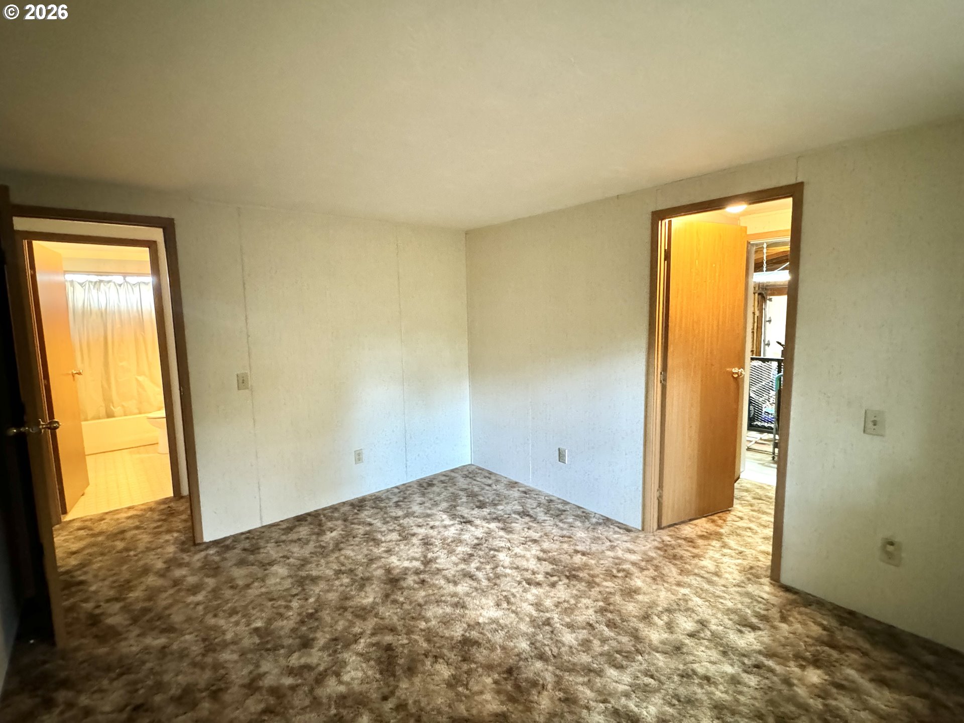 1600 Rhododendron Drive, Unit 245 Florence, OR 97439 - Photo 31 of 47 a view of an empty room and window