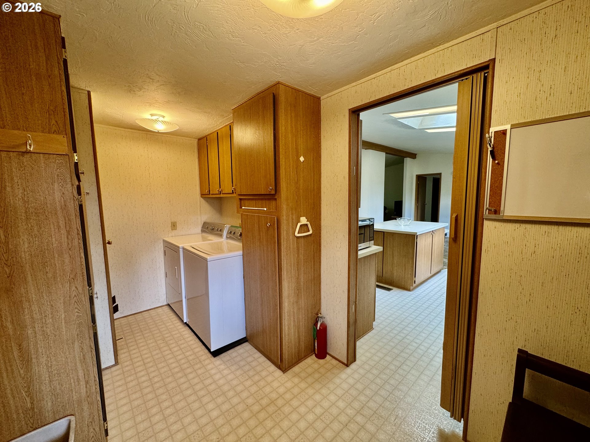 1600 Rhododendron Drive, Unit 245 Florence, OR 97439 - Photo 33 of 47 a view of a hallway with storage space