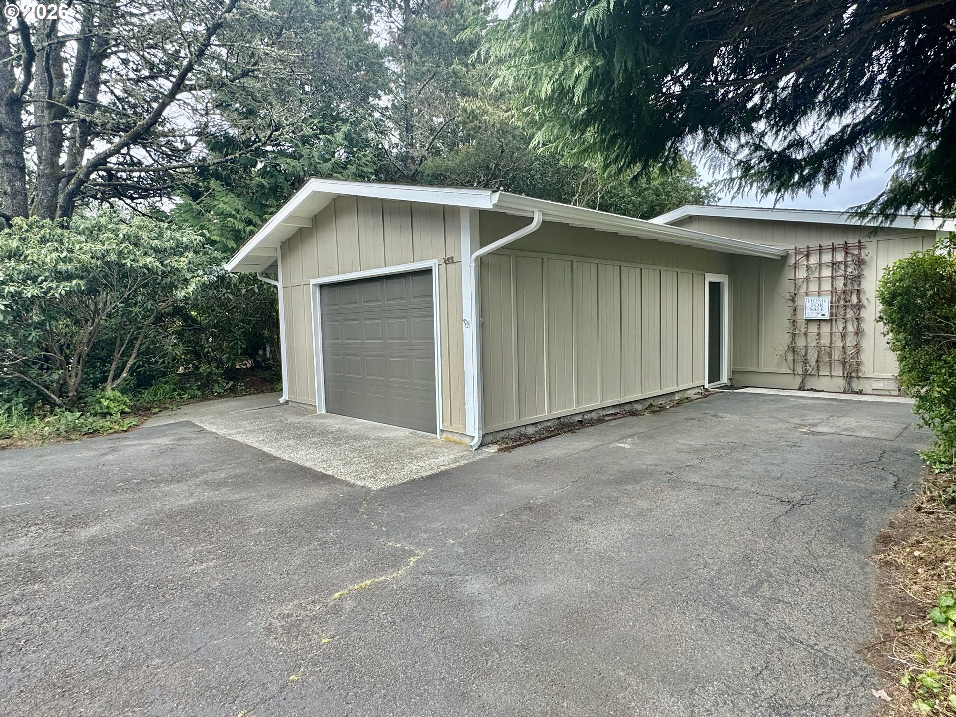 1600 Rhododendron Drive, Unit 245 Florence, OR 97439 - Photo 39 of 47 a house with a outdoor space