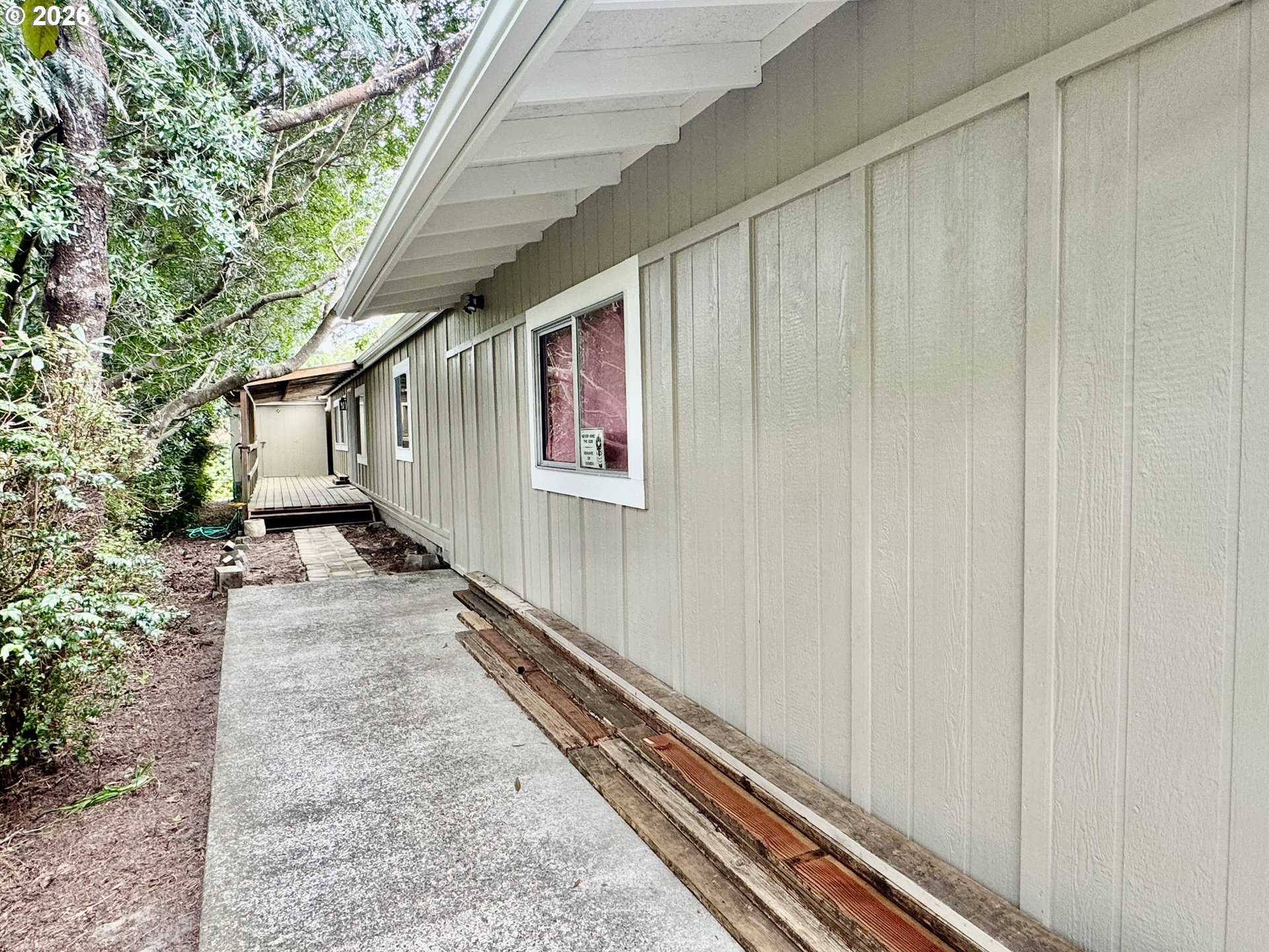 1600 Rhododendron Drive, Unit 245 Florence, OR 97439 - Photo 4 of 47 a backyard of a house
