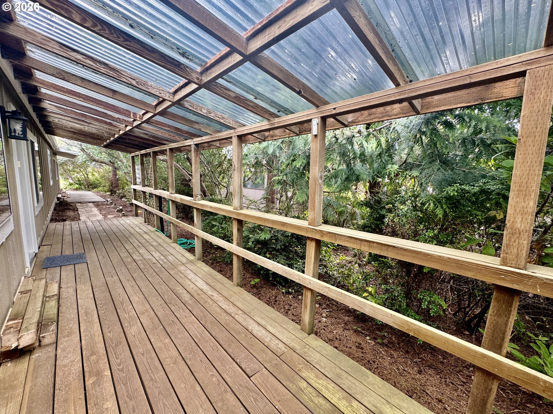 1600 Rhododendron Drive, Unit 245 Florence, OR 97439 - Photo 5 of 47 a view of porch with wooden floor