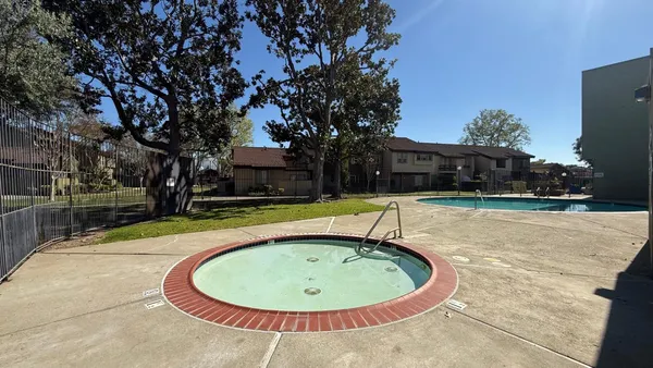 a view of outdoor space and swimming pool