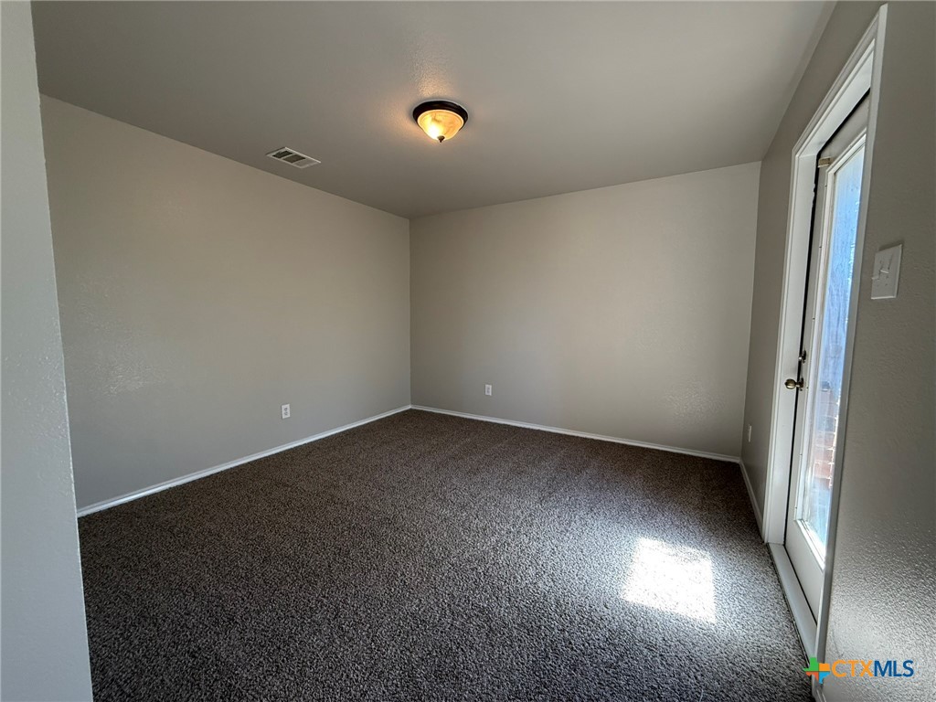 8716 Starview Street Temple, TX 76502 - Photo 13 of 20 an empty room with a window