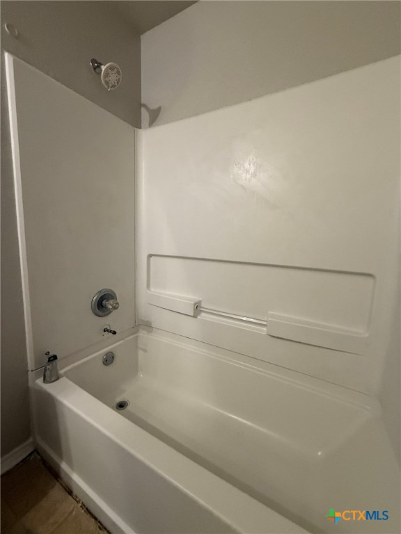 8716 Starview Street Temple, TX 76502 - Photo 18 of 20 a bathroom with a bathtub