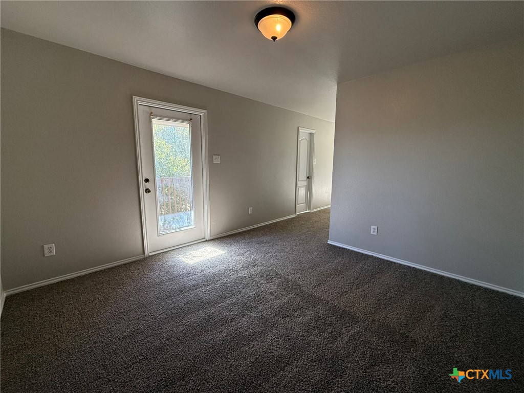8716 Starview Street Temple, TX 76502 - Photo 2 of 20 an empty room with windows