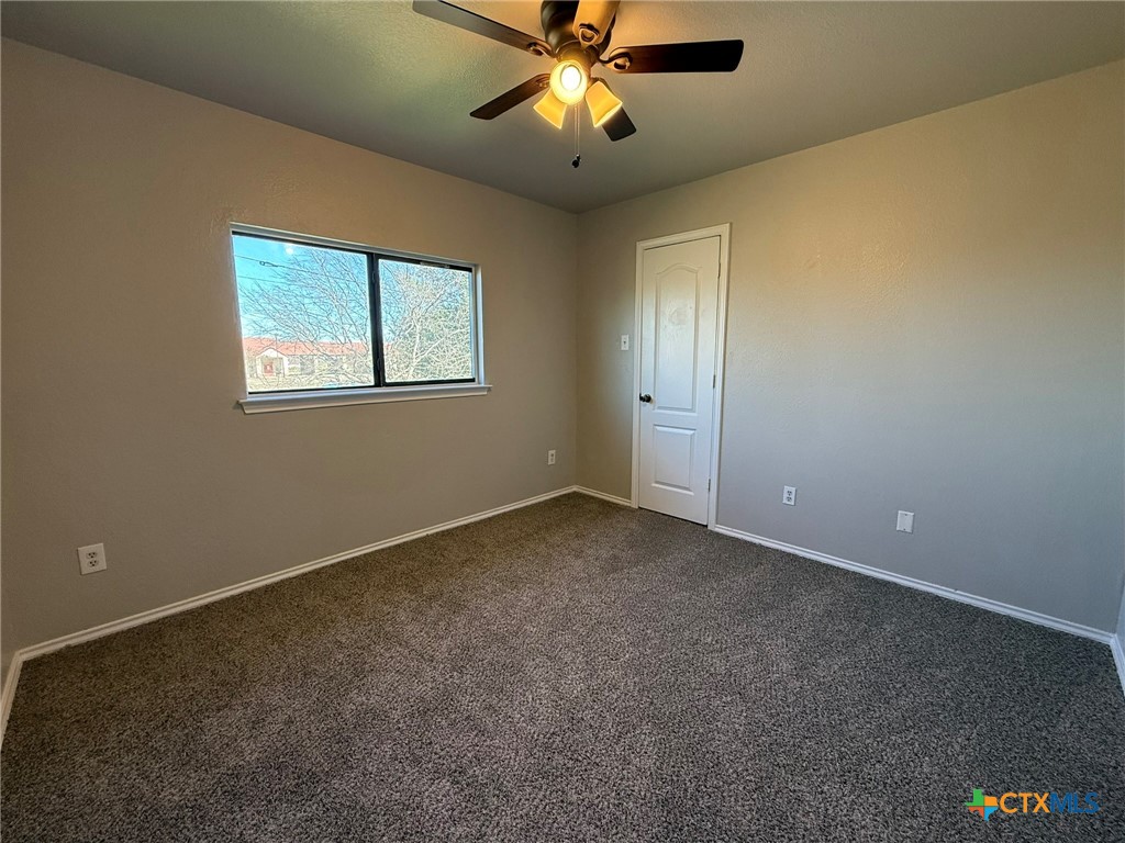 8716 Starview Street Temple, TX 76502 - Photo 3 of 20 a view of an empty room with a window