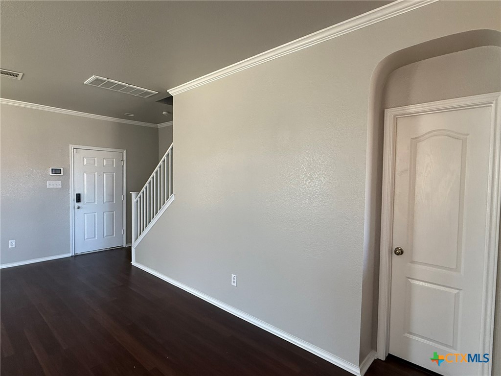 8716 Starview Street Temple, TX 76502 - Photo 9 of 20 a view of entryway with wooden floor