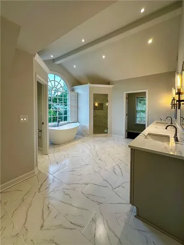 a view of a sink and a window in a room