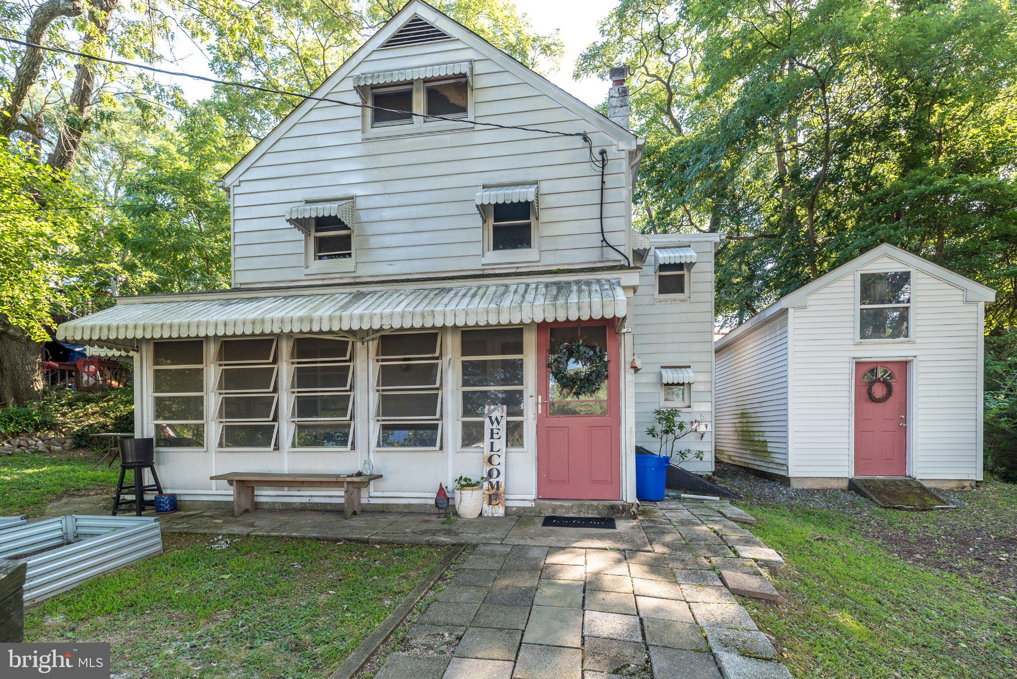 109 Ridge Street Reading, PA 19607 - Photo 1 of 41 Charming home nestled in nature's embrace.