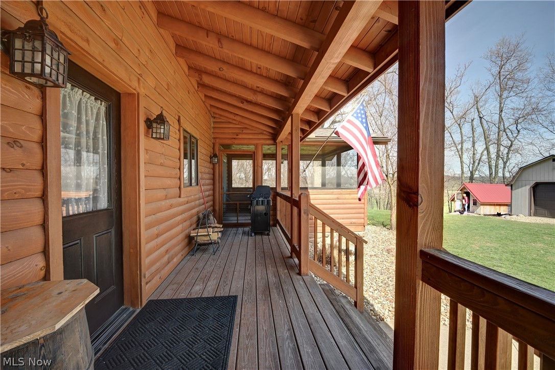 8045 McFadden Road Shreve, OH 44676 - Photo 21 of 45 Deck featuring a yard