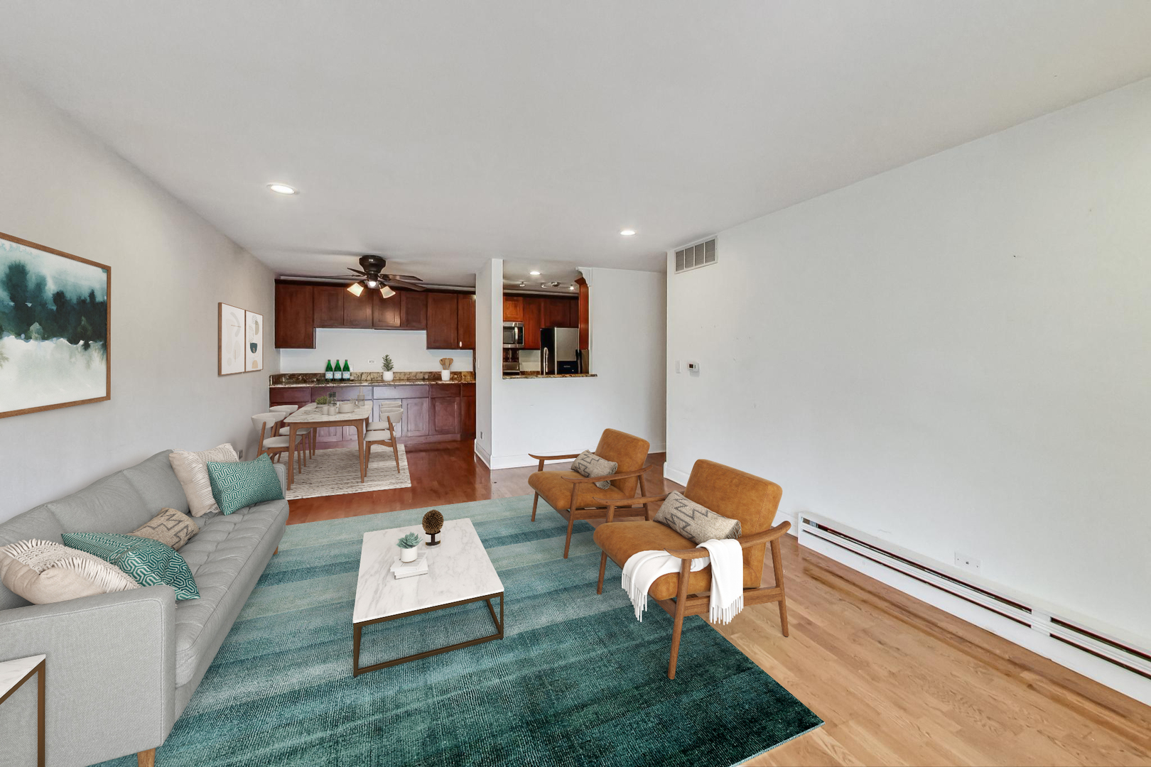 1931 Prairie Square, Unit 108 Schaumburg, IL 60173 - Photo 12 of 40 a living room with furniture and kitchen view