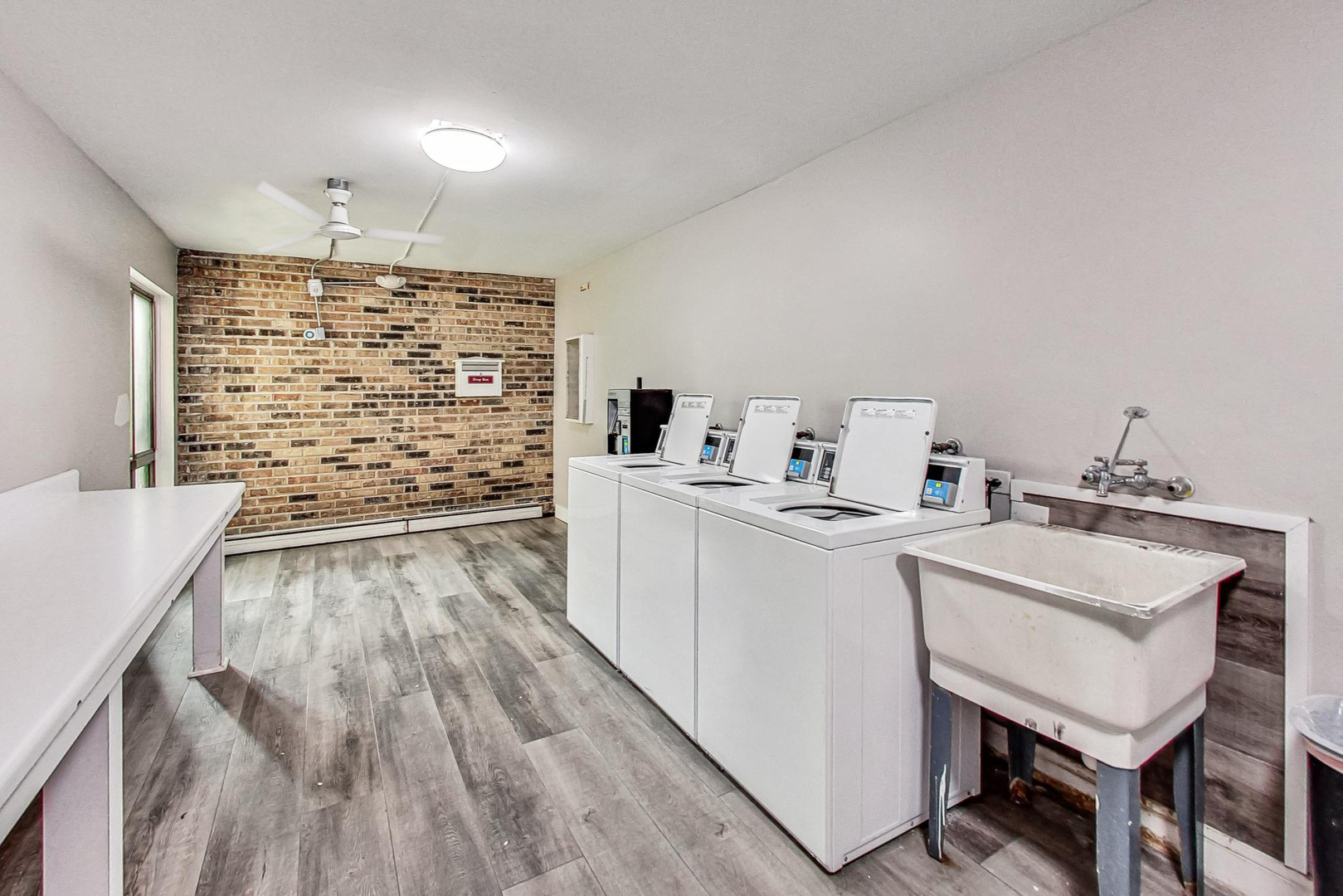 1931 Prairie Square, Unit 108 Schaumburg, IL 60173 - Photo 35 of 40 a room with a storage and utility