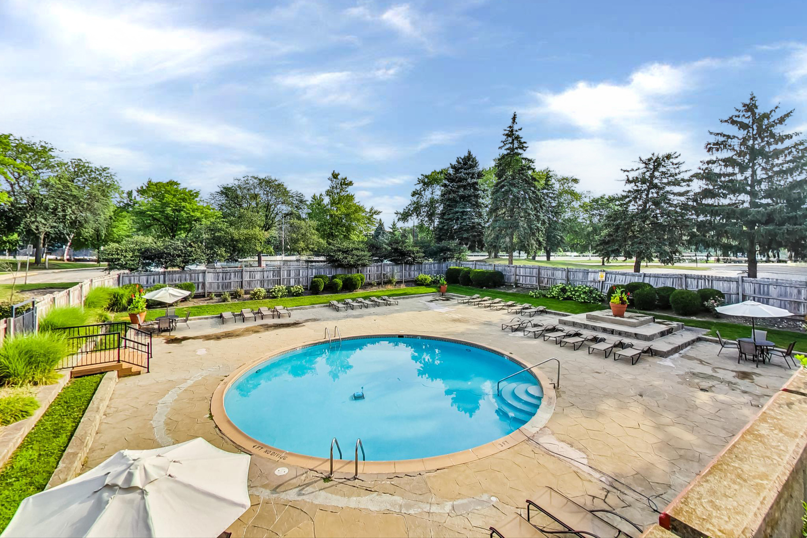 1931 Prairie Square, Unit 108 Schaumburg, IL 60173 - Photo 36 of 40 a view of swimming pool having outdoor seating