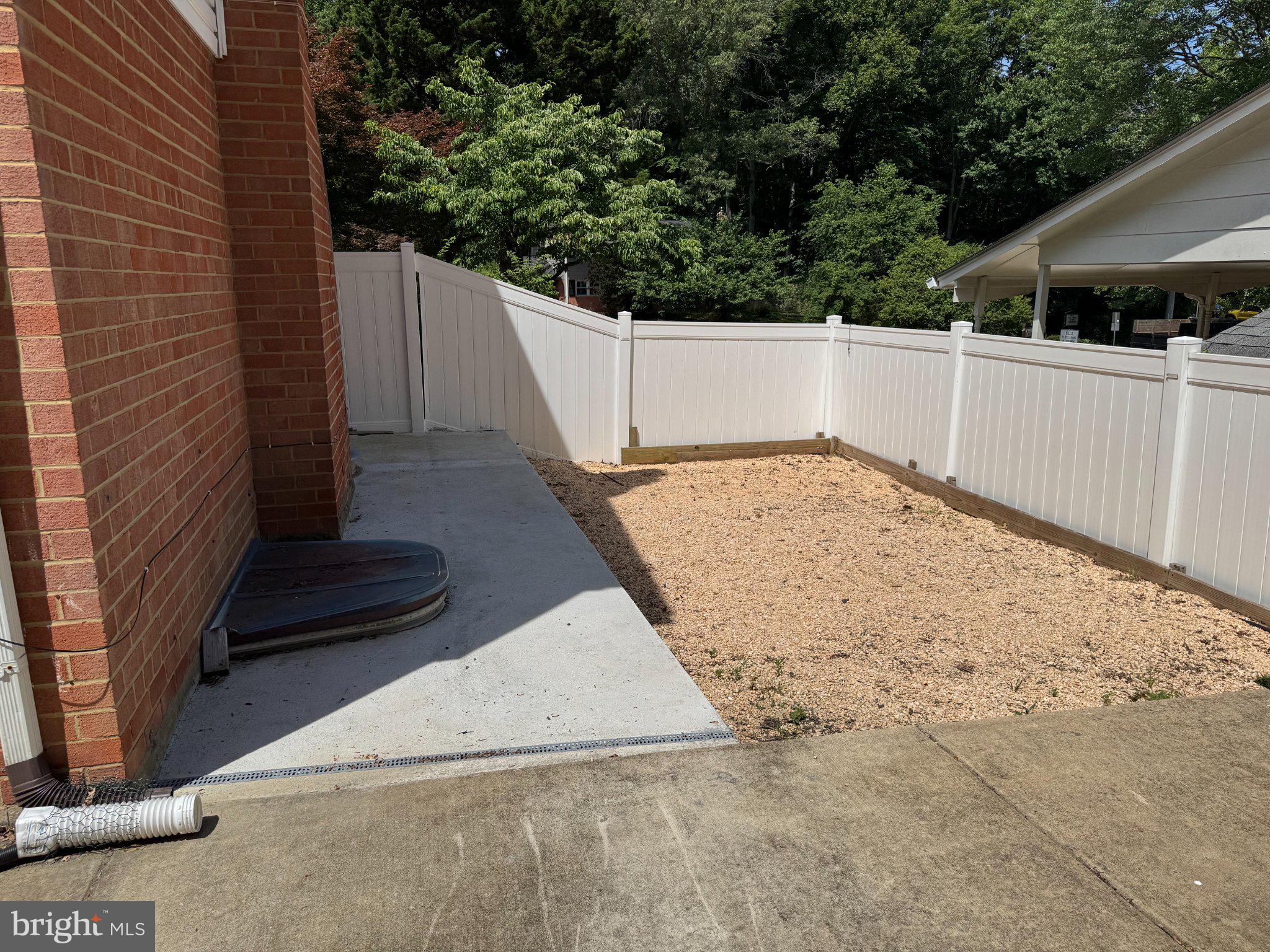 6603 Huntsman Boulevard Springfield, VA 22152 - Photo 53 of 64 Sunny outdoor space ready for ideas.
