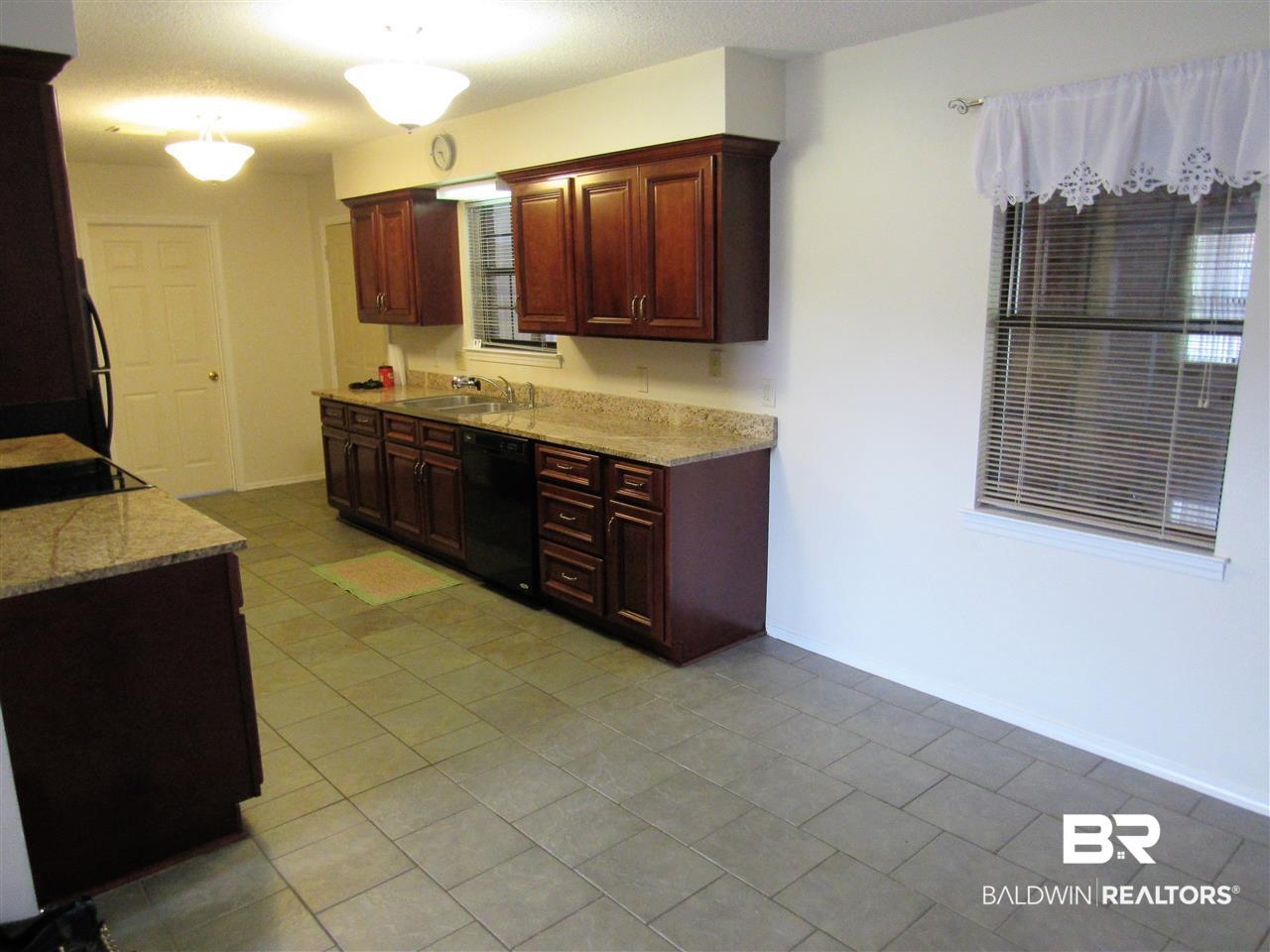 510 Ariel Avenue Foley, AL 36535 - Photo 4 of 18 New paint, granite countertops, nice cabinets....