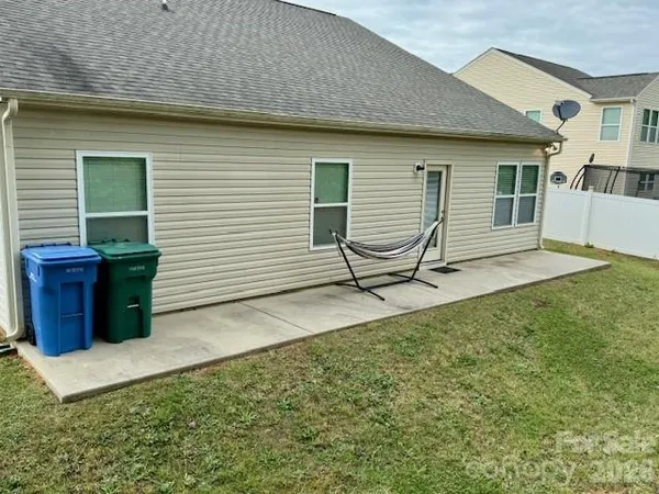 a house view with a backyard space