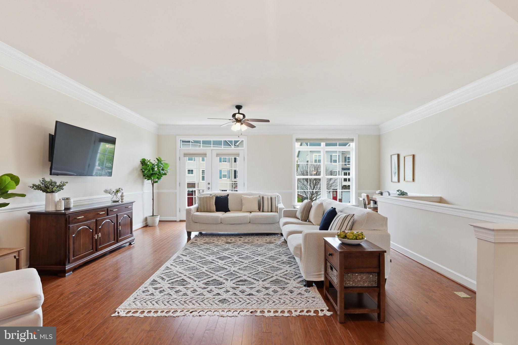 204 Miles Hawk Terrace Purcellville, VA 20132 - Photo 3 of 40 a living room with furniture flat screen tv and window