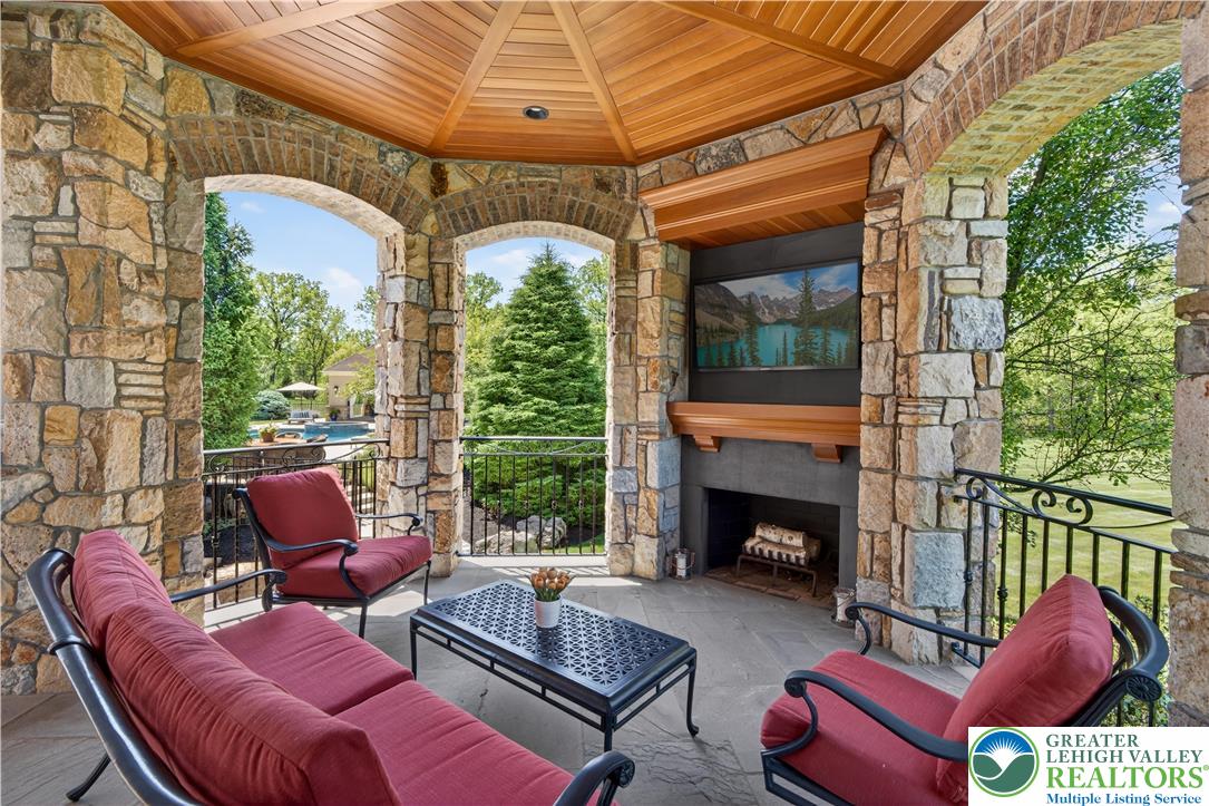 1731 Red Hawk Way Bethlehem, PA 18015 - Photo 83 of 85 Wraparound Porch with stone fireplace
