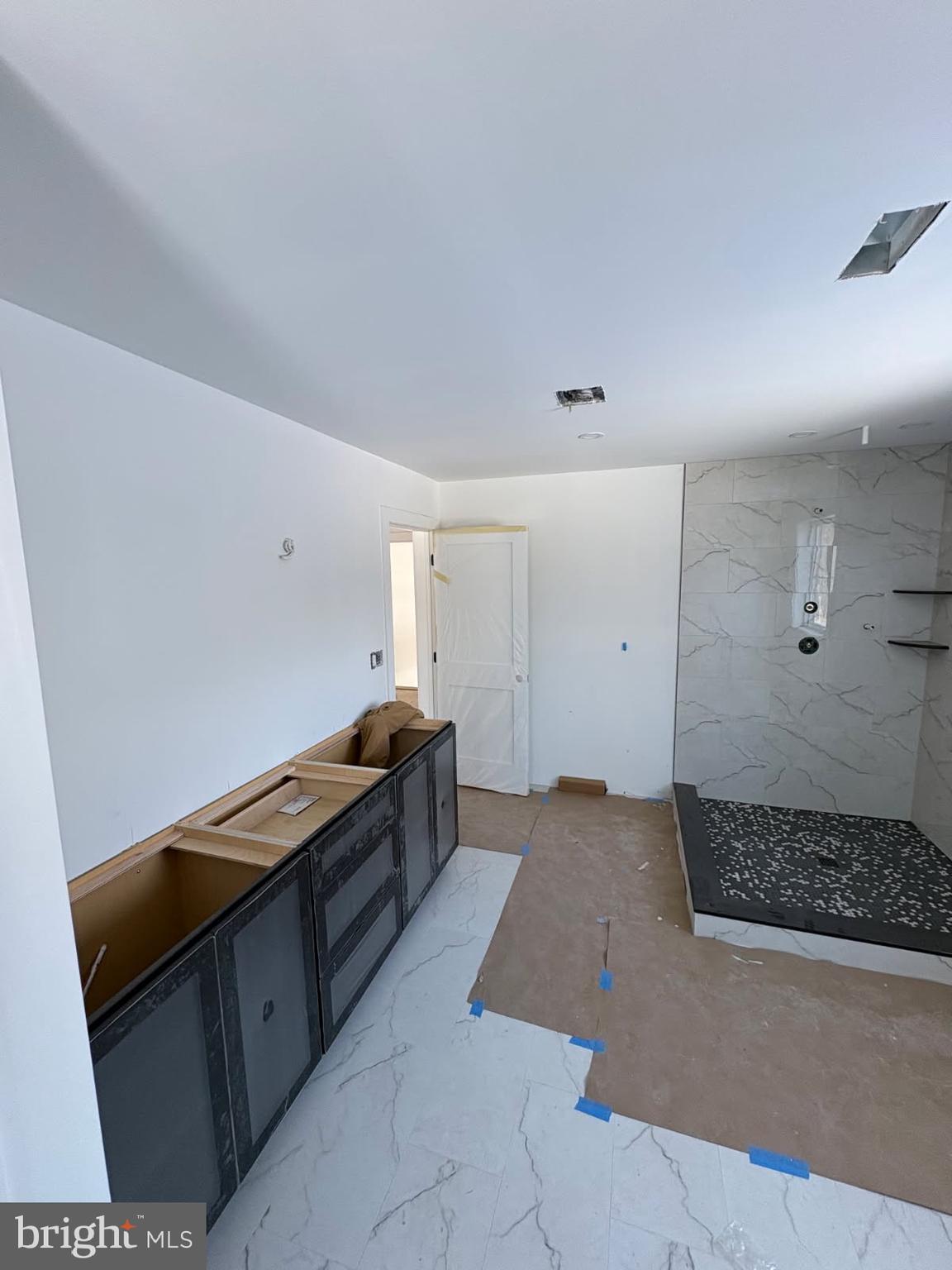 5987 Point Pleasant Pike Doylestown, PA 18902 - Photo 15 of 20 a kitchen with a sink and cabinets