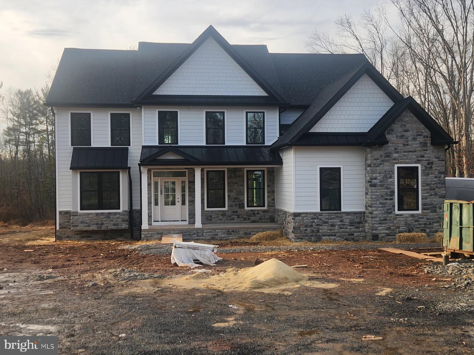 5987 Point Pleasant Pike Doylestown, PA 18902 - Photo 2 of 20 a front view of a house with a yard