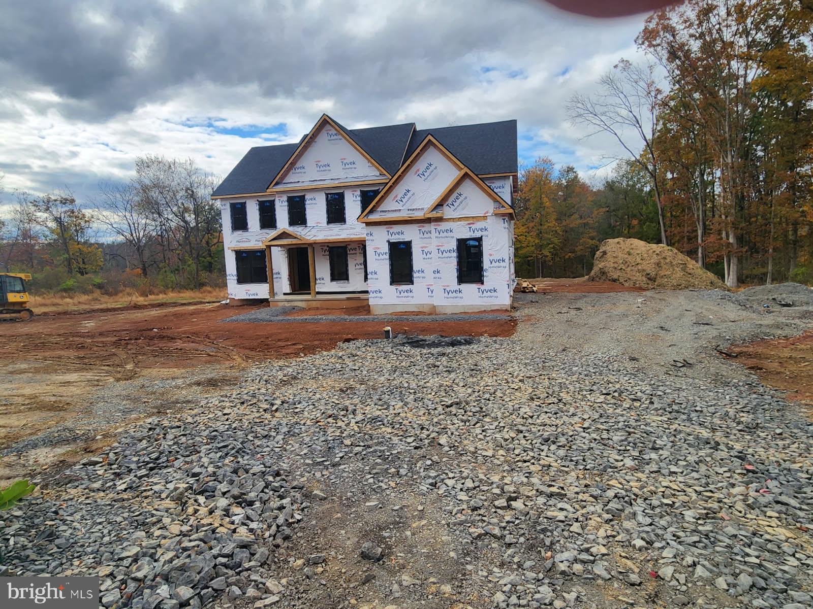 5987 Point Pleasant Pike Doylestown, PA 18902 - Photo 4 of 6 a front view of a house with a yard