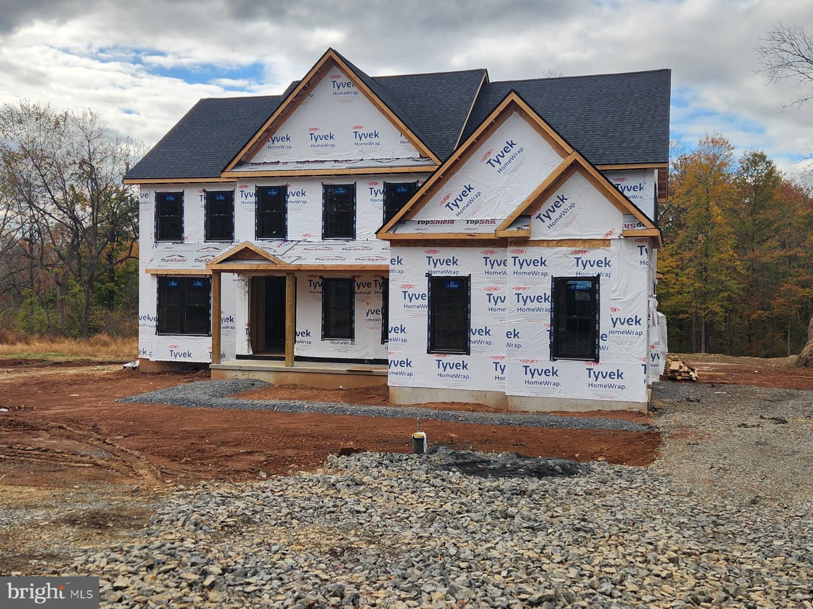 5987 Point Pleasant Pike Doylestown, PA 18902 - Photo 5 of 6 a front view of a house with a yard