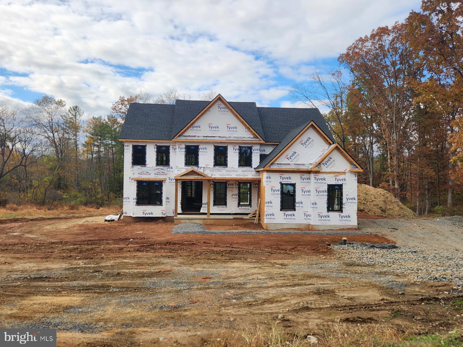 5987 Point Pleasant Pike Doylestown, PA 18902 - Photo 5 of 20 a front view of a house with a yard