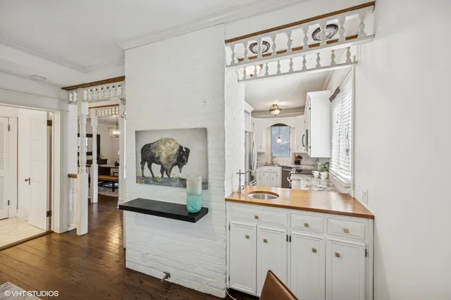 a en suite bathroom with a sink and a mirror