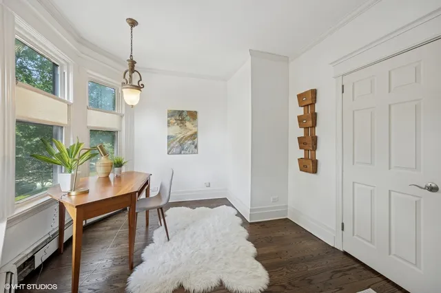 a workspace with furniture and window