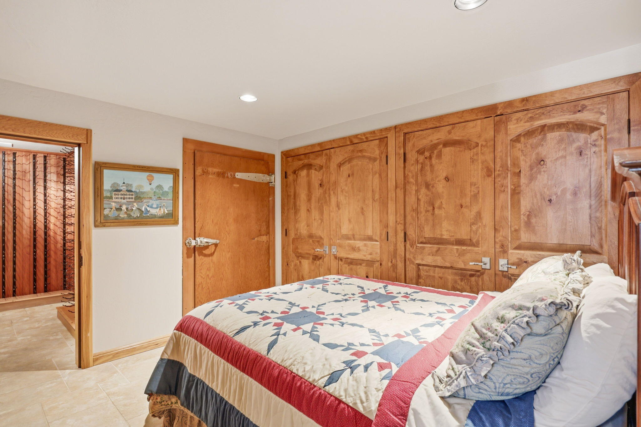 985 Elliott Creek Road Wilderville, OR 97543 - Photo 50 of 98 a bedroom with a large bed and a closet