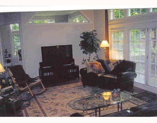717 Chestnut Road Edgeworth, PA 15143 - Photo 3 of 8 Den/Family/Great Room. This room is open to the kitchen and feels open to the outdoors with so many wonderful windows. The opposite wall features a raised hearth gas log fireplace with granite surround.