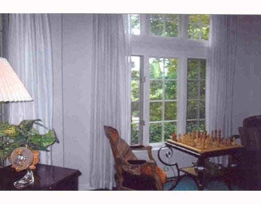 717 Chestnut Road Edgeworth, PA 15143 - Photo 5 of 8 Living Room. Pretty windows and interesting angles inspire easy conversation in this room.