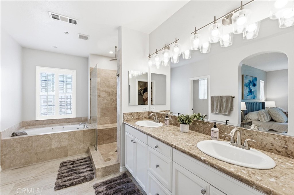21245 Alanis Circle Huntington Beach, CA 92648 - Photo 26 of 50 Spa like primary bathroom