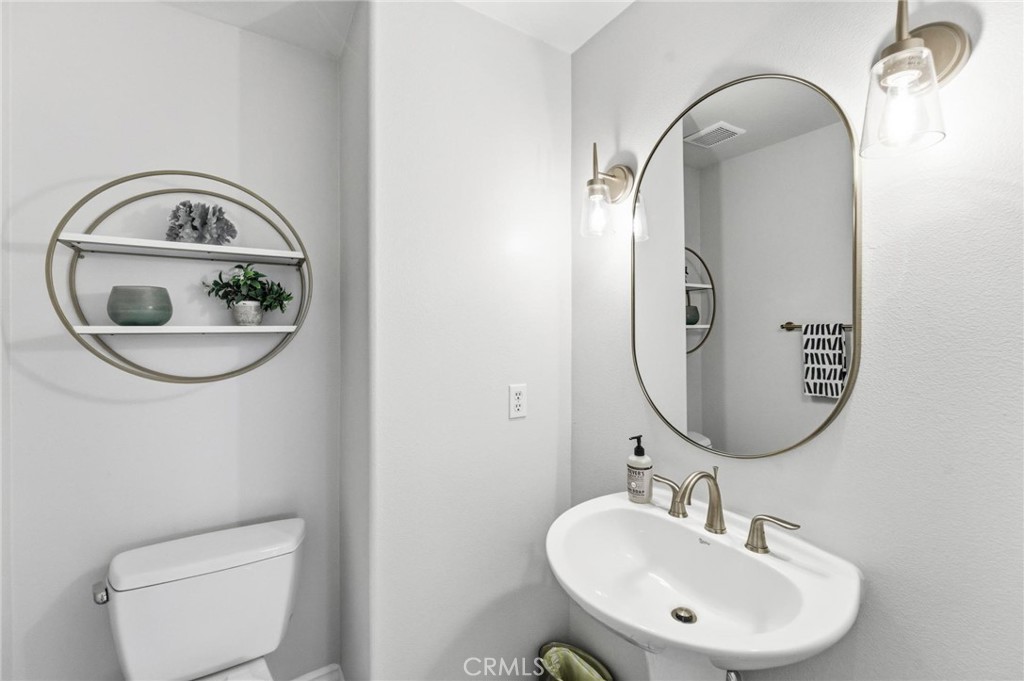 21245 Alanis Circle Huntington Beach, CA 92648 - Photo 33 of 50 Powder room downstairs