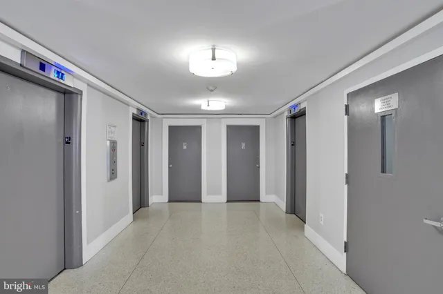 a view of a hallway with front door